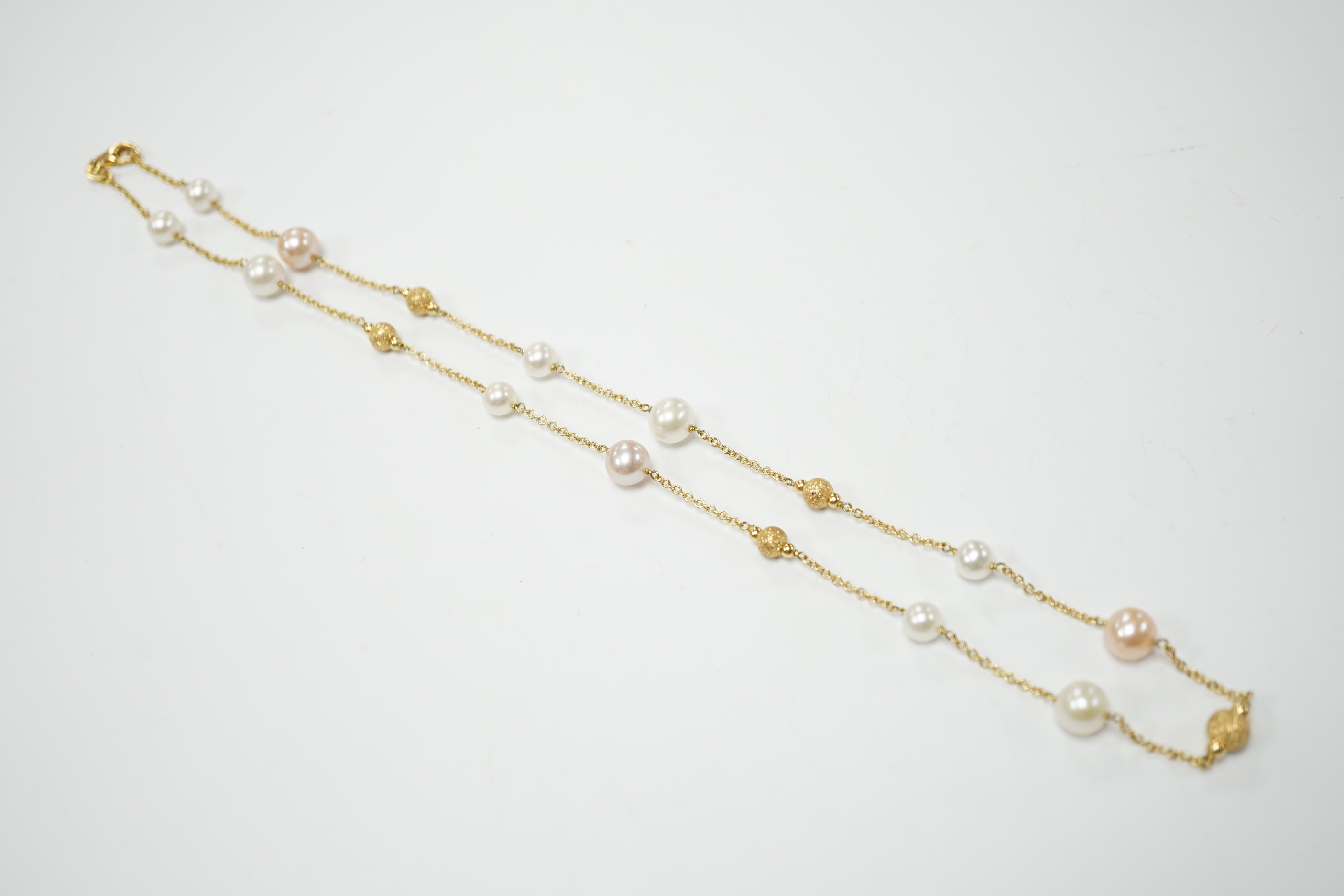 A modern Italian 18ct gold, twelve stone two colour cultured pearl and five gold sphere set necklace, 48cm, gross weight 13.4 grams.